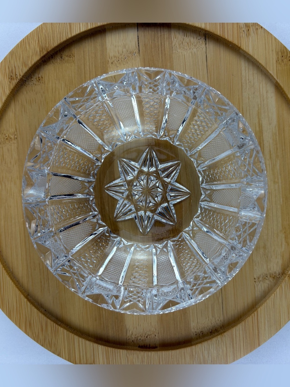 Vintage Crystal Cut Glass Ashtray Featuring a Star-Shaped Pattern.